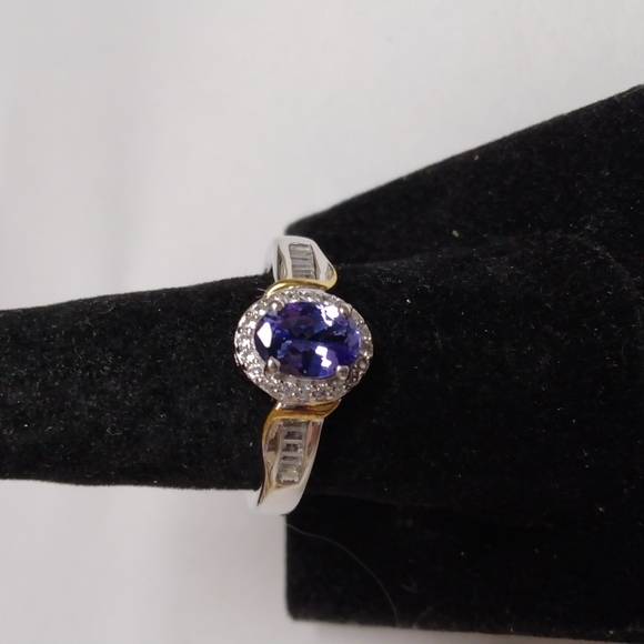Stamped .925 Tanzanite and Diamond Ring. 4.6 Grams